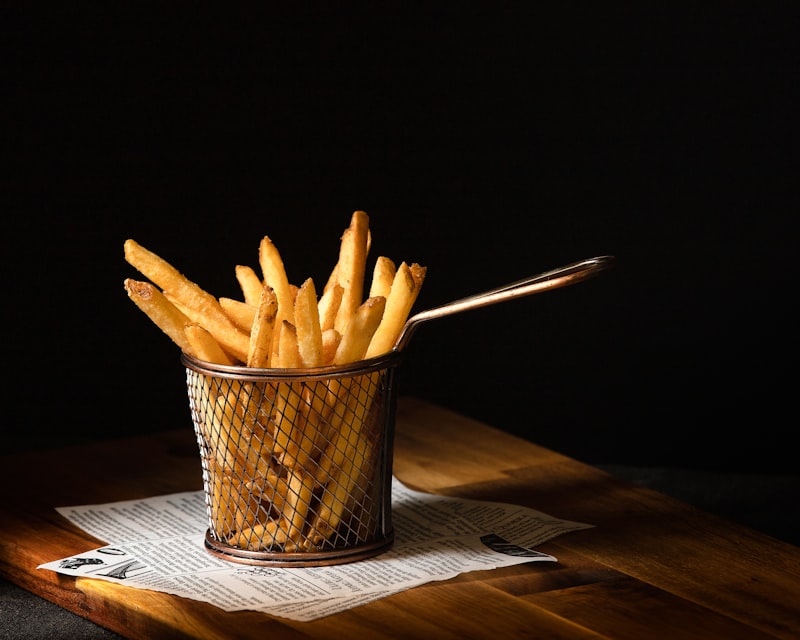 Seasoned fries tossed in a house spice mix